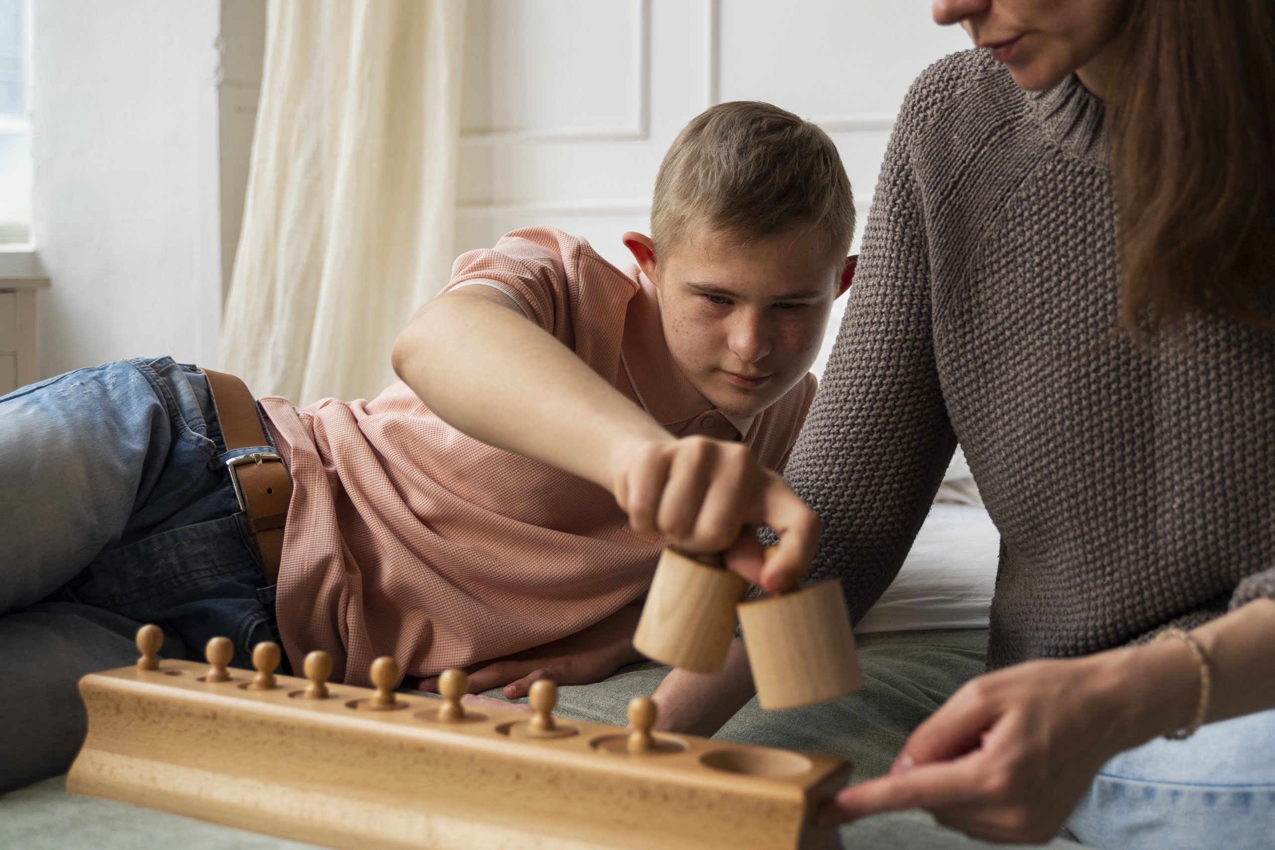 front-view-kid-playing-with-wooden-toy